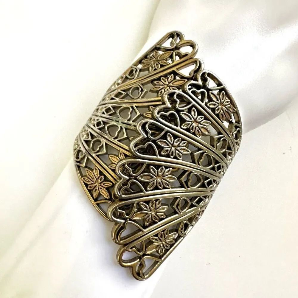 Silver tone floral clamper bangle bracelet